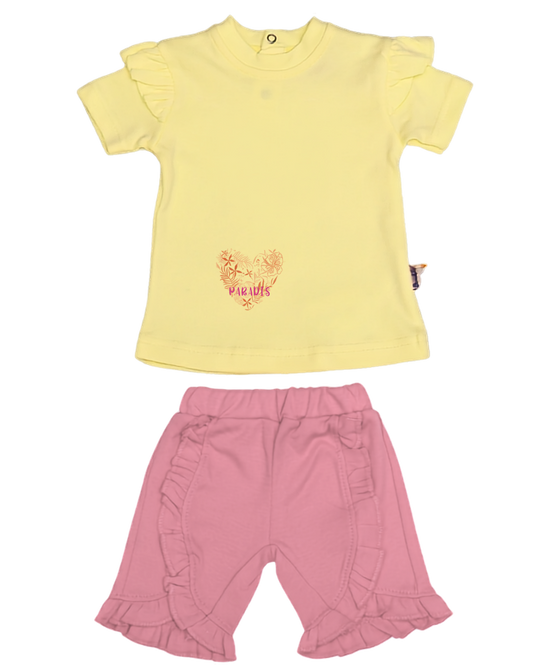 2-piece baby girl set — lemon yellow flutter top with Paradis tropical heart embroidery and blush pink ruffle shorts